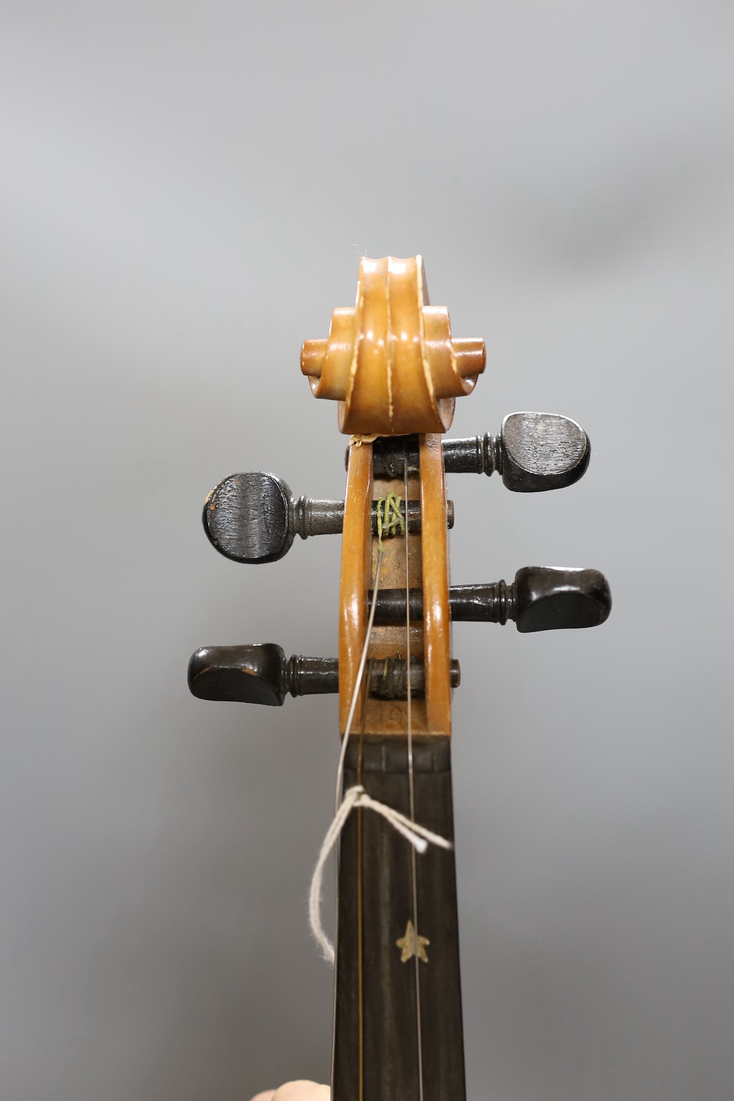 A cased 20th century Romanian violin, back measures 35.5cm excl button